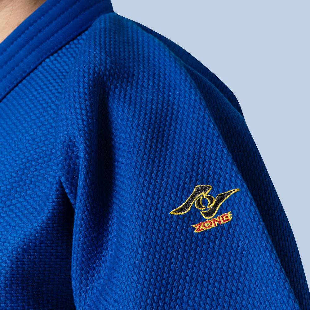 Blue IJF judo jacket closed up with Zone logo