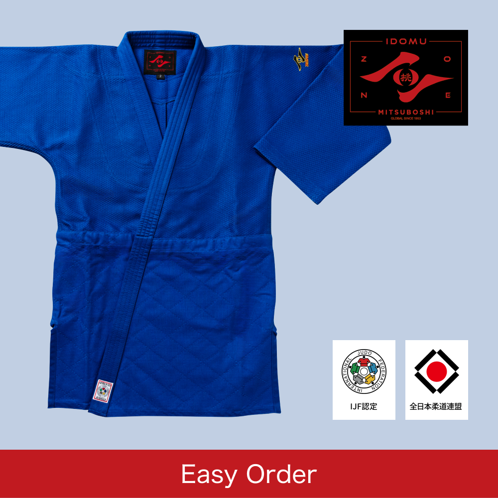 Blue judo jacket with the Zone logo on a light blue background
