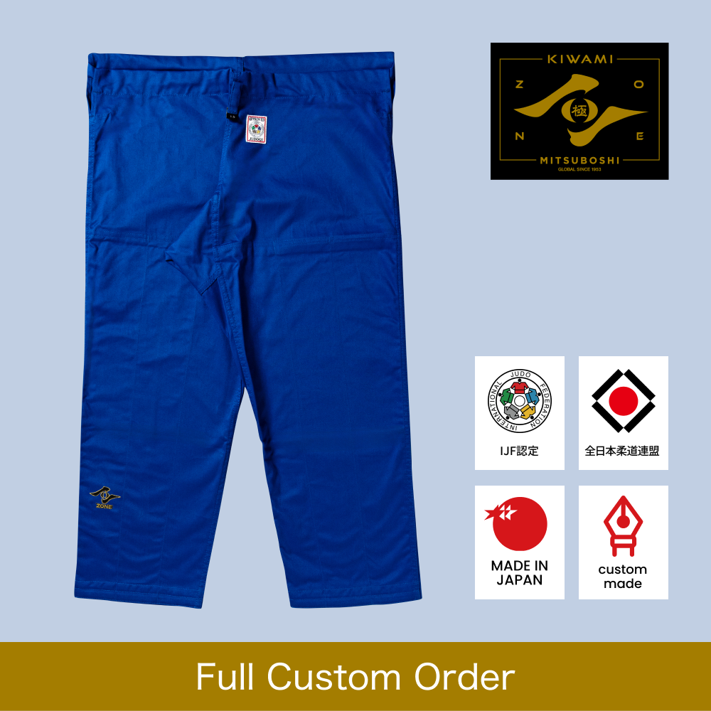 Kiwami ijf blue judo pants on light blue background