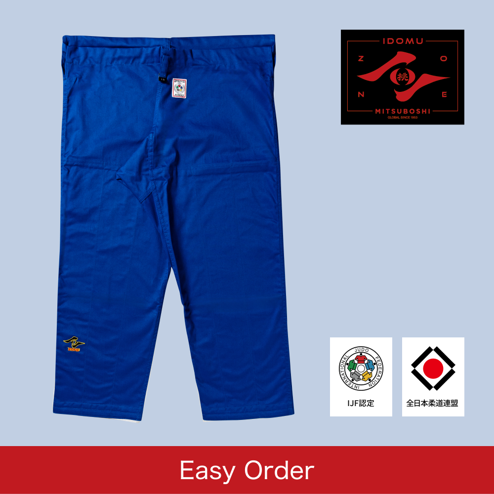 Blue judo pants with the Zone logo on a light blue background
